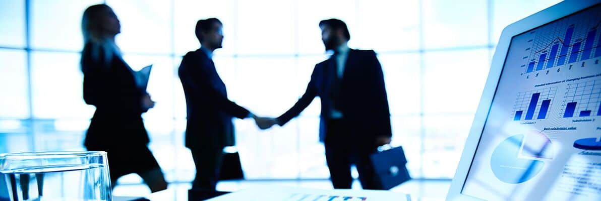 two men shaking hands